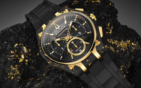 Extravagant: Goldflocken in gewölbtem Carbon / BULOVA CURV 150th Anniversary Special Edition - Foto: presseportal.de Extravagant: Goldflocken in gewölbtem Carbon / BULOVA CURV 150th Anniversary Special Edition - Foto: presseportal.de