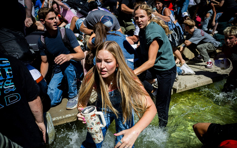Menschen rennen weg, nachdem Kirk angeschossen wurde. - Foto: Tess Crowley/The Deseret News/dpa