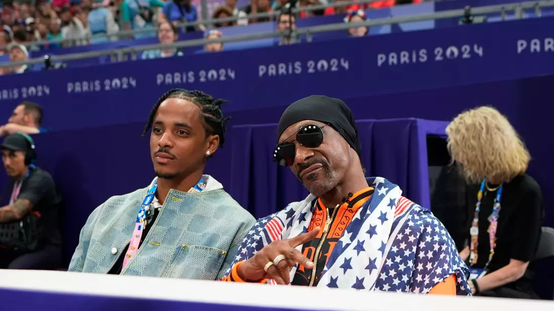 Snoop Dogg (r) sorgte für hohe TV-Quoten bei NBC. - Bild: Lindsey Wasson/AP/dpa