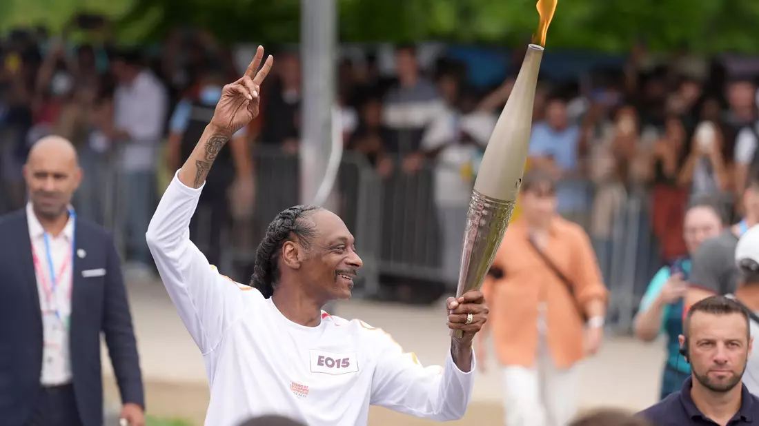 Auch  beim Fackellauf in Paris war Snoop Dogg - Bild: Marcus Brandt/dpa