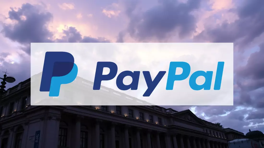 PayPal Faces Critical Test as Analyst Downgrade Offsets Partnership Gains Illustration mit AI erstellt übermittelt durch boerse-global.de