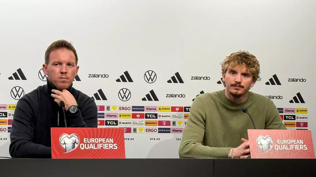 Bundestrainer Nagelsmann (l.) setzt auch auf Nick Woltemade (r.).  - Bild: Arne Richter/dpa