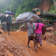 Viele Regionen kämpfen mit Erdrutschen. - Foto: Lakshmen Neelawathura/AP/dpa