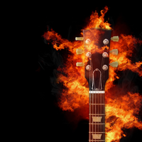 Flammendes Statement: Die Kopfplatte einer Gitarre steht lichterloh in Flammen und steht sinnbildlich für glühende Rockenergie. - Foto: THN