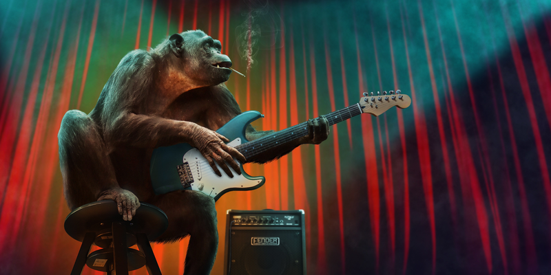 Cooler Auftritt der besonderen Art: Ein Schimpanse hält lässig eine E-Gitarre und posiert mit Zigarette neben dem Verstärker. - Foto: THN
