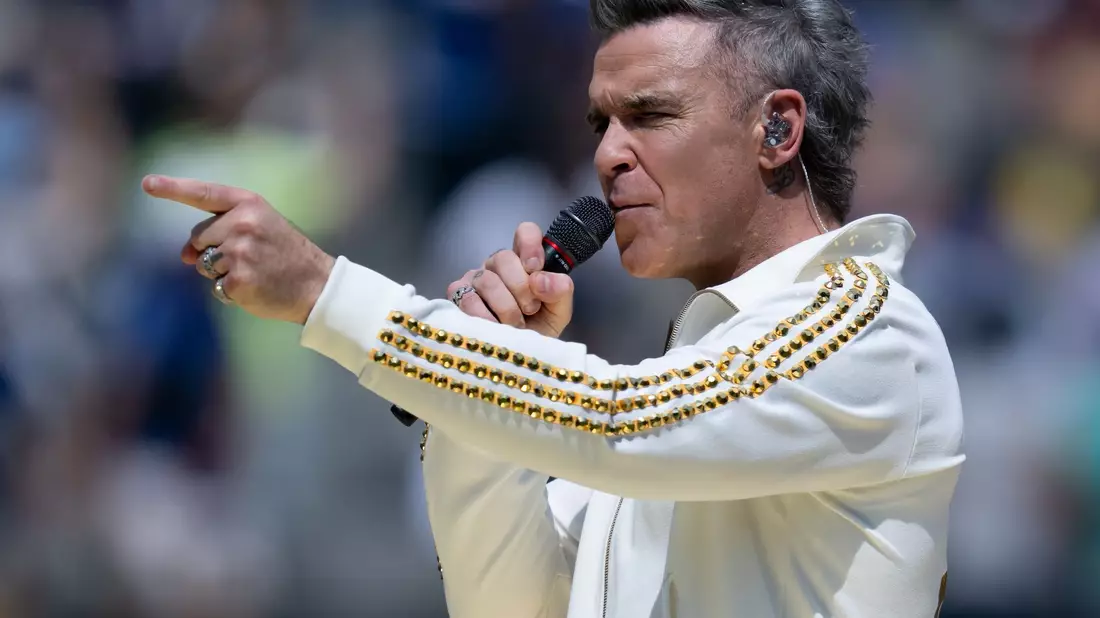 Robbie Williams hat ein neues Album auf den Markt gebracht. (Archivbild) - Bild: Sven Hoppe/dpa