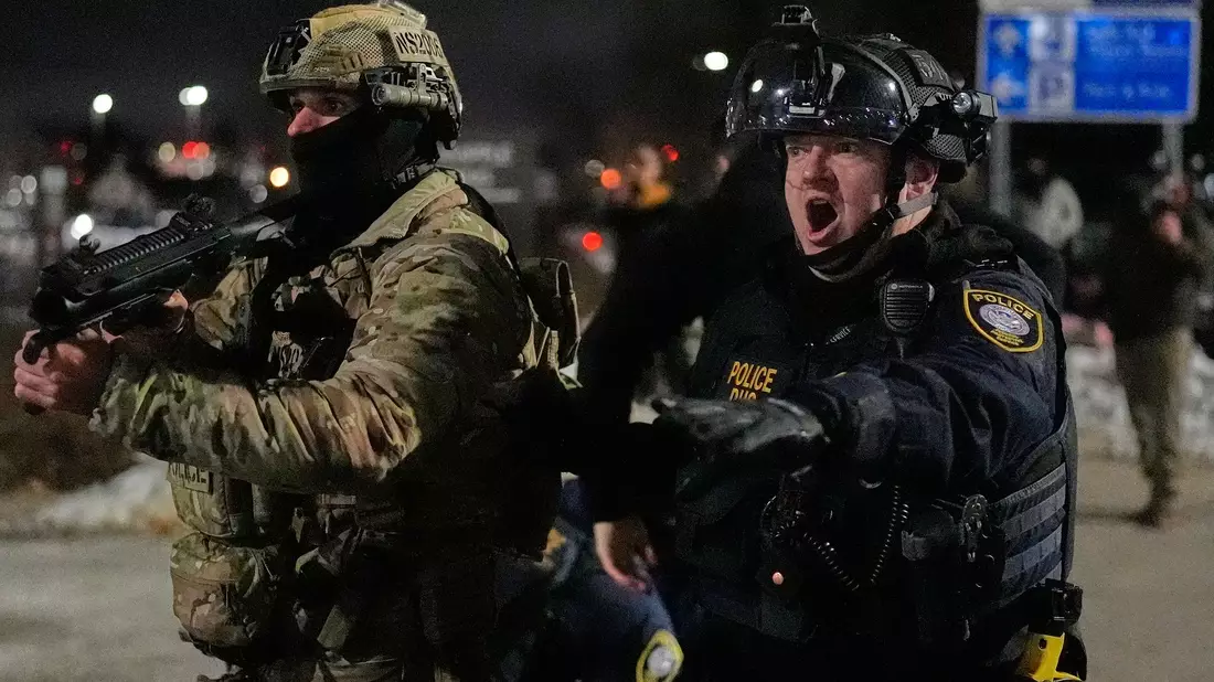 Die Lage in Minesota ist angespannt.  - Bild: Yuki Iwamura/AP/dpa