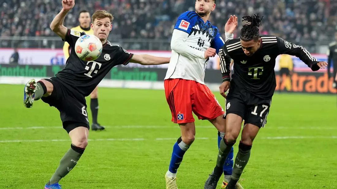 Hart umkämpftes Spiel zwischen den Bayern und dem HSV. - Bild: Marcus Brandt/dpa