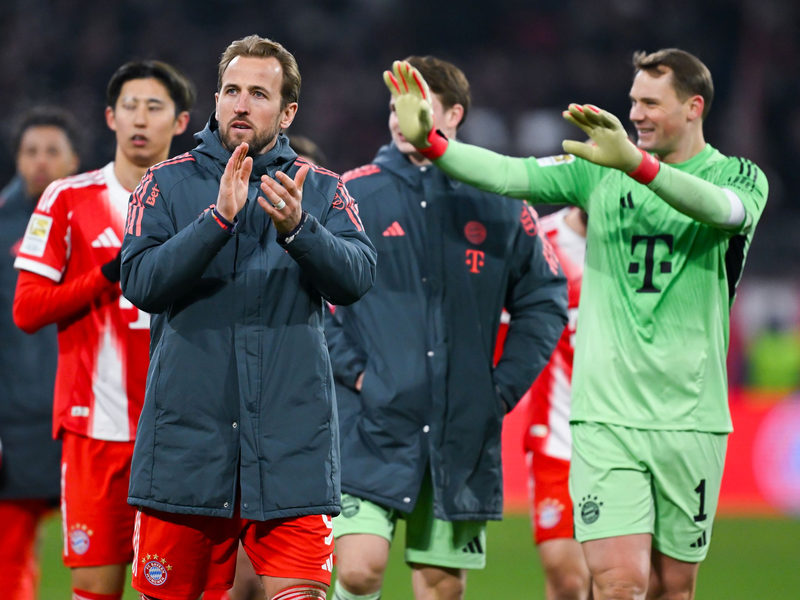 Verlängern sie beim FC Bayern? Harry Kane (l) und Manuel Neuer (r). (Archivbild) - Foto: Sven Hoppe/dpa