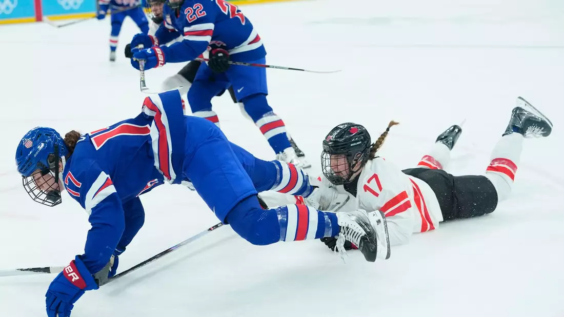 Harter Fight im Olympia-Endspiel der Eishockey-Erzrivalinnen - Bild: Petr David Josek/AP/dpa