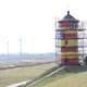 Der vergleichsweise kleine Leuchtturm ist schon seit Jahren nicht mehr im Dienst - dafür aber ein beliebtes Fotomotiv in Ostfriesland.  - Foto: Lars Penning/dpa
