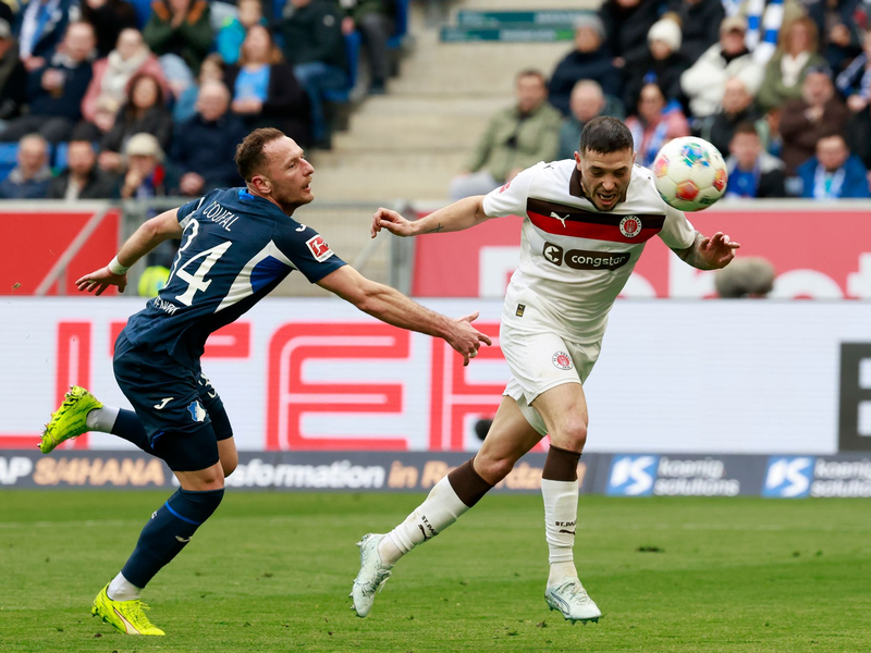 Mathias Pereira Lage köpft zum 1:0 für St. Pauli ein. - Foto: Heiko Becker/dpa