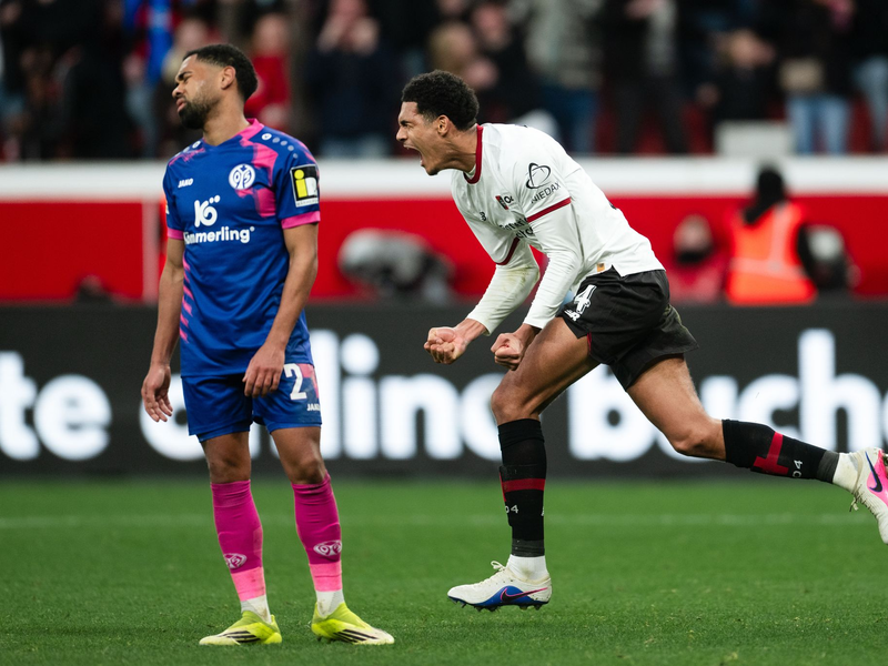 Leverkusens Jarell Quansah jubelt über den Ausgleich.  - Foto: Marius Becker/dpa