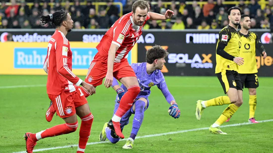 Harry Kane (2. v. l.) traf auch gegen den BVB. - Bild: Federico Gambarini/dpa