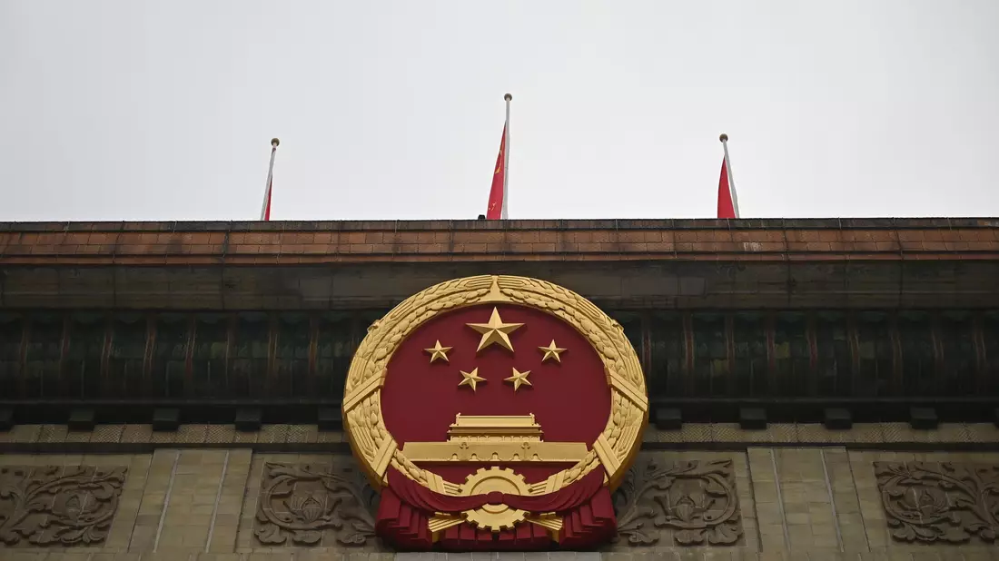 In Peking beginnt der Volkskongress. Zum Auftakt legt Chinas Führung eine niedrigere Untergrenze für das Wachstum fest.  - Bild: Johannes Neudecker/dpa