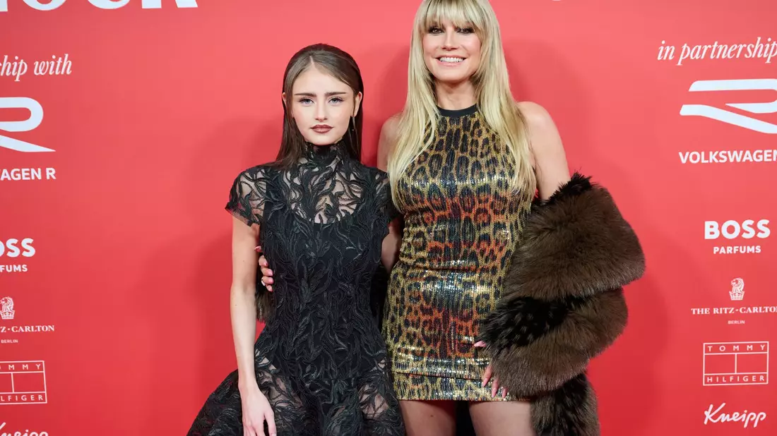 Heidi Klum steht neben ihrer Tochter Leni. (Archivbild) - Bild: Annette Riedl/dpa