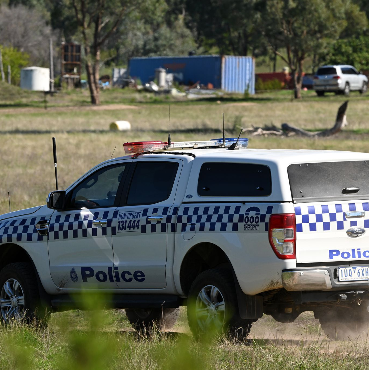 Polizisten nahmen einen mutmaßlichen Polizistenmörder fest. - Foto: James Ross/AAP/dpa