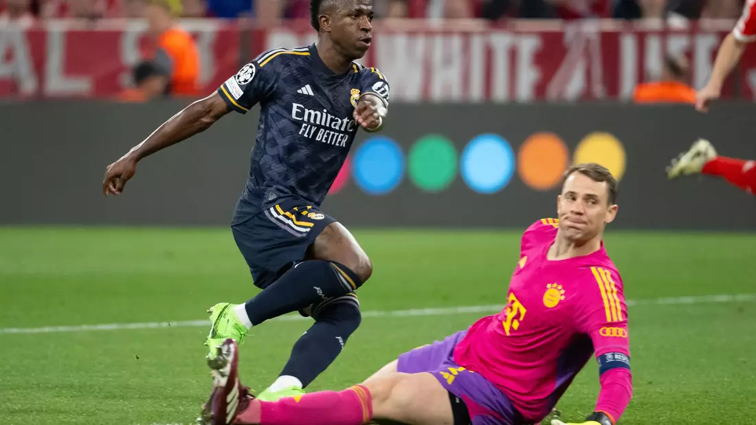 Brisantes Wiedersehen: Real-Star Vinícius Júnior und Bayern-Torwart Manuel Neuer. (Archivbild) - Bild: Sven Hoppe/dpa