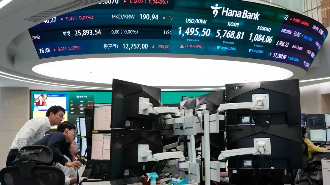 Der südkoreanische Leitindex Kospi steigt den zweiten Tag in Folge. - Bild: Ahn Young-joon/AP/dpa