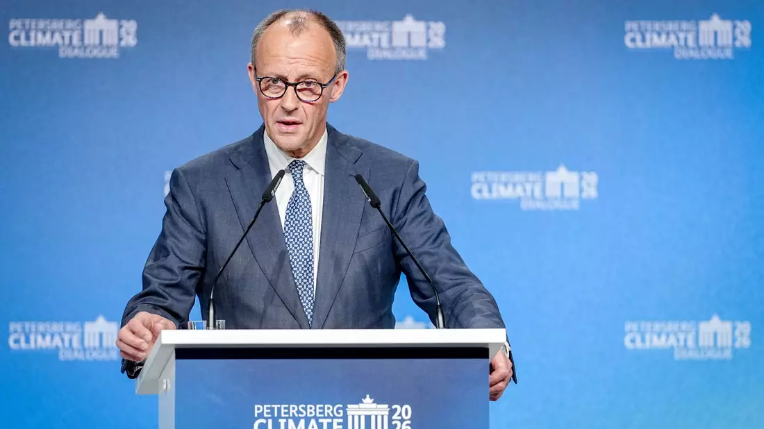 Bundeskanzler Merz betont Verlässlichkeit in der Klimapolitik.  - Bild: Kay Nietfeld/dpa