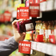 Auch Rewe-Kunden kauften zuletzt häufiger Eigenmarkenprodukte. (Archivbild) - Foto: Oliver Berg/dpa