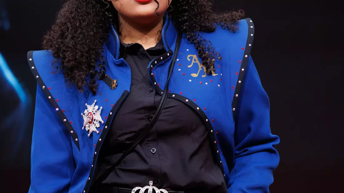 Viele Fans kamen zur internationalen Premiere von «Michael» im typischen Michael Jackson-Look. (Archivbild) - Bild: Carsten Koall/dpa