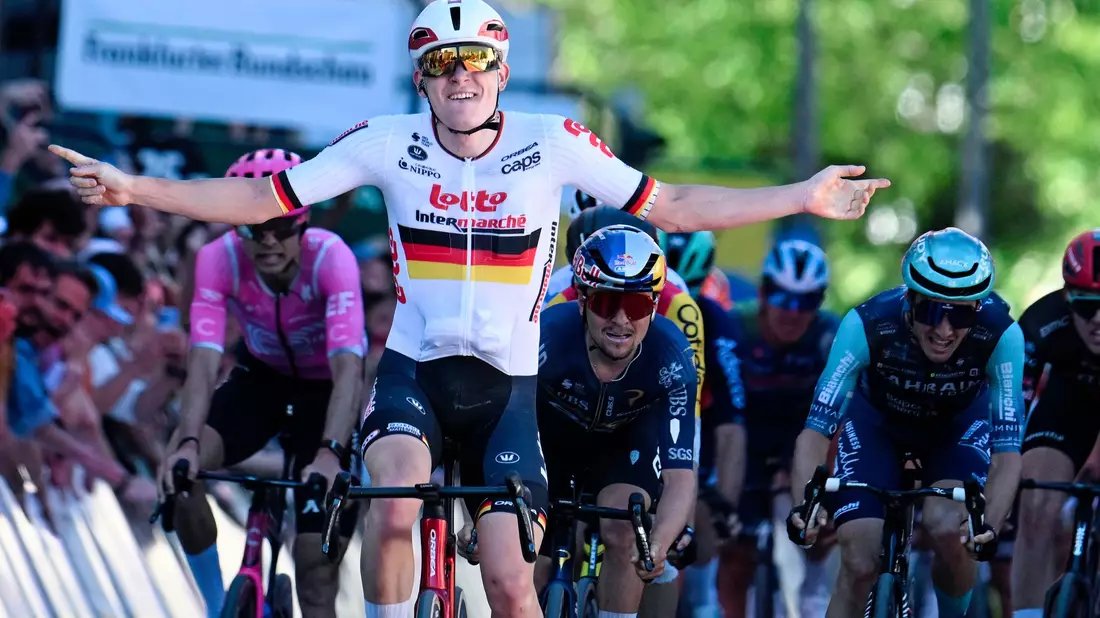 Georg Zimmermann feiert im deutschen Meistertrikot einen überraschenden Coup beim Klassiker Eschborn-Frankfurt. - Bild: Uwe Anspach/dpa