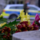An der Zufahrt zur Grimmaischen Straße wurden Blumen abgelegt.  - Foto: Hendrik Schmidt/dpa