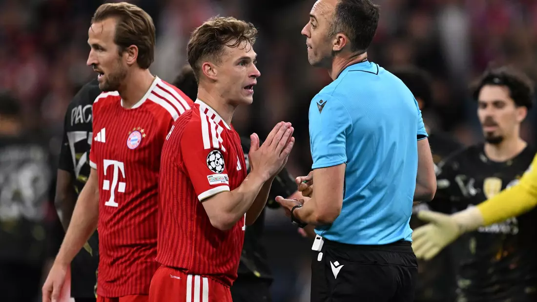 Kimmich reklamiert beim portugiesischen Referees. - Bild: Sven Hoppe/dpa