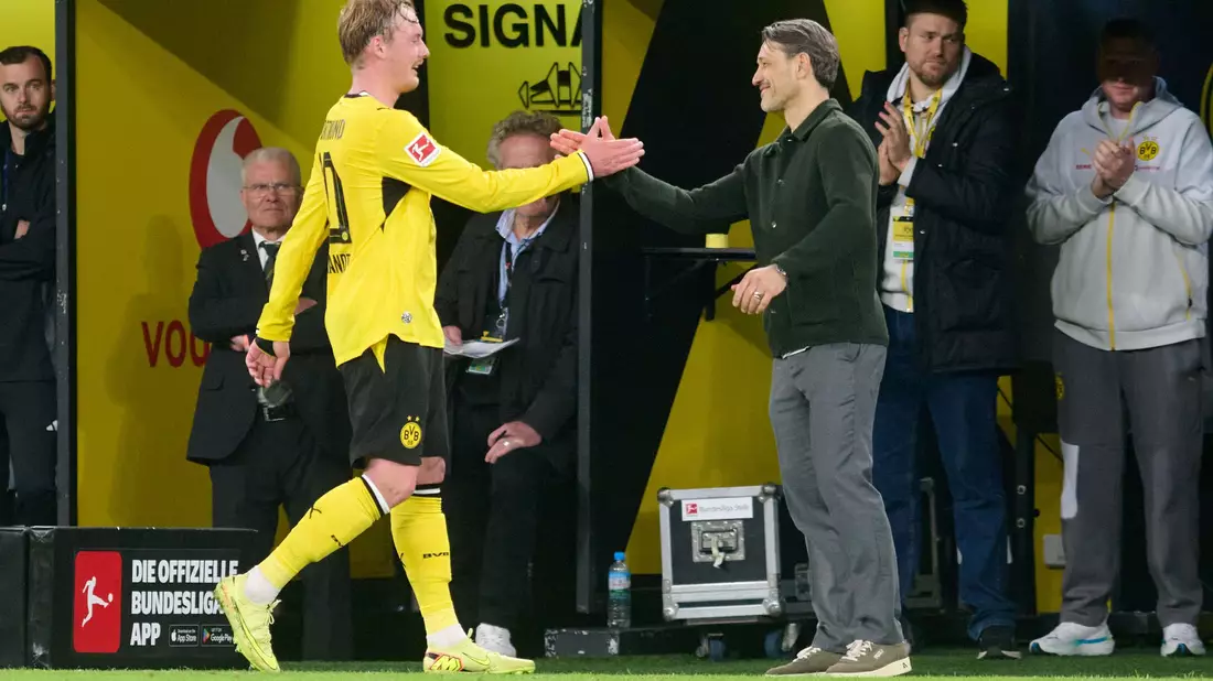 Julian Brandt (l) und sein Noch-Coach Niko Kovac.  - Bild: Bernd Thissen/dpa