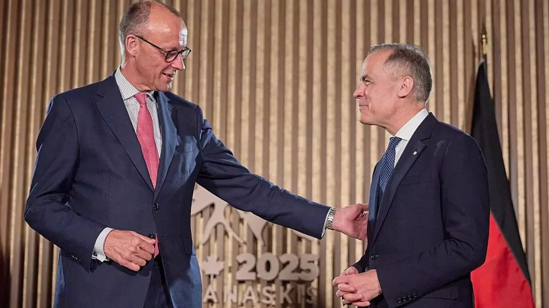 Friedrich Merz und Mark Carney (Archiv) - Bild: via dts Nachrichtenagentur