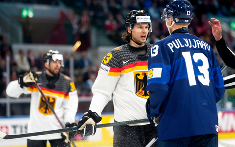 Kapitän Moritz Seider im Wortgefecht mit NHL-Kollege Jesse Puljujarvi. - Foto: Claudio Thoma/KEYSTONE/dpa