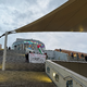 Die Aktivisten protestierten mit Sprechchören und Plakaten auf den Stufen der städtischen Hauptbücherei gegen die Teilnahme Israels am ESC.  - Foto: Britta Schultejans/dpa