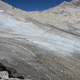 Kaum noch Schnee liegt auf einem Gletscher auf dem Zugspitzplatt. - Foto: Angelika Warmuth/dpa