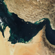 Die Straße von Hormus verbindet den Persischen Golf mit dem Golf von Oman. (Archivbild)  - Foto: -/The Visible Earth/NASA/dpa