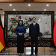 Zum Auftakt ihrer Reise traf Reiche den chinesischen Spitzenbeamten Zhou Haibing. - Foto: Johannes Neudecker/dpa