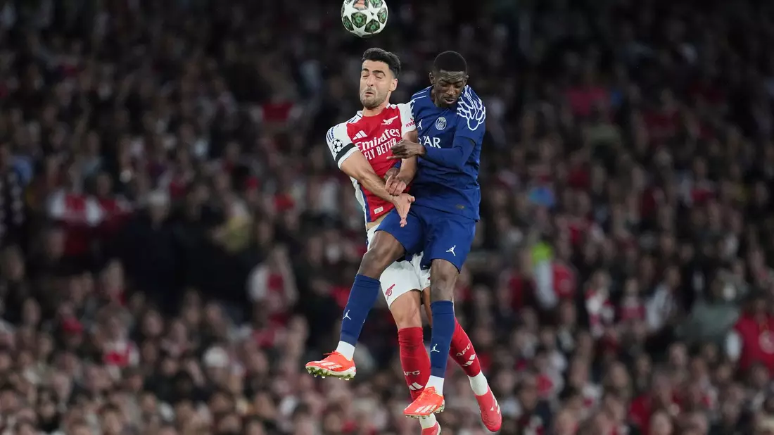 Treffen am Samstag erneut aufeinander: Arsenals Mikel Merino und Ousmane Dembele (r) von PSG. (Archivbild) - Bild: Kin Cheung/AP/dpa