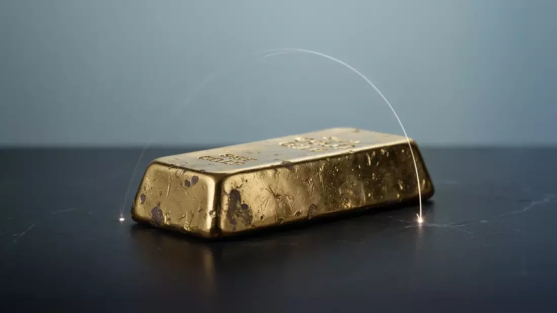 Oro: el pulso entre la demanda china y la rigidez de la Fed mantiene el metal a 900 dólares de su récord Illustration mit AI erstellt übermittelt durch boerse-global.de