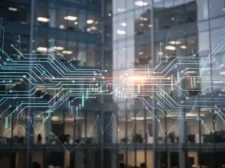 Abstrakte Darstellung von Datenflüssen und Finanzgraphen mit einem modernen Bürogebäude im Hintergrund, symbolisiert Technologie und IPO-Gespräche. - Foto: über boerse-global.de