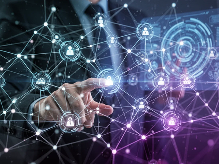 A glowing network of digital nodes and lines, symbolizing AI agents and enterprise platforms, with a hand interacting with a holographic interface. - Foto: über boerse-global.de