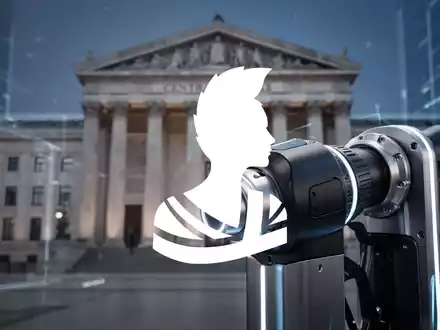 Nahaufnahme einer Brennstoffzelle mit einem unscharfen Hintergrund, der ein Zentralbankgebäude andeutet. - Foto: über boerse-global.de