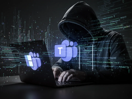 A shadowy figure in a hoodie uses a laptop, with a Microsoft Teams logo reflected on the screen, surrounded by digital data streams. - Foto: über boerse-global.de