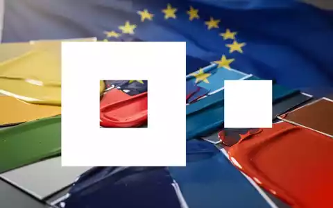 Nahaufnahme von glänzenden Farbmustern, die Industrielacke darstellen, mit einer angedeuteten EU-Flagge im Hintergrund. - Foto: über boerse-global.de