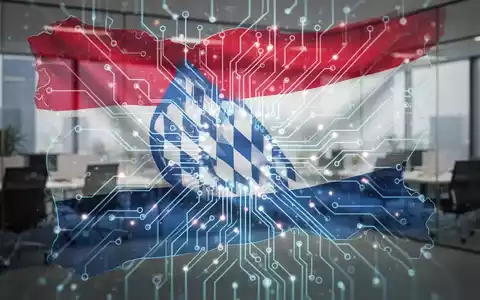Eine stilisierte, leuchtende Platine mit einer Umrandung der bayerischen Flagge, die digitale Souveränität und Technologie symbolisiert. - Foto: über boerse-global.de