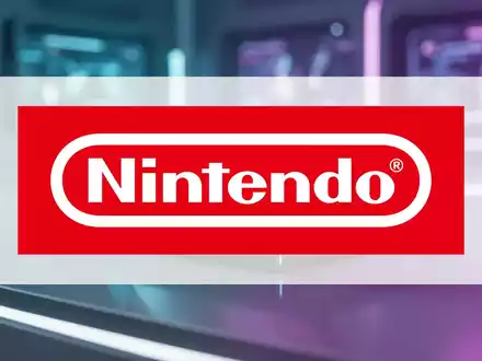 Eine moderne Spielkonsole, möglicherweise eine Nintendo Switch, sitzt auf einer reflektierenden Oberfläche mit futuristischer Beleuchtung. - Foto: über boerse-global.de