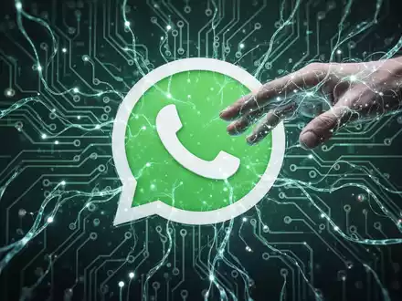 Digital illustration of the WhatsApp logo intertwined with AI neural network lines and circuit patterns, with a hand reaching in. - Foto: über boerse-global.de