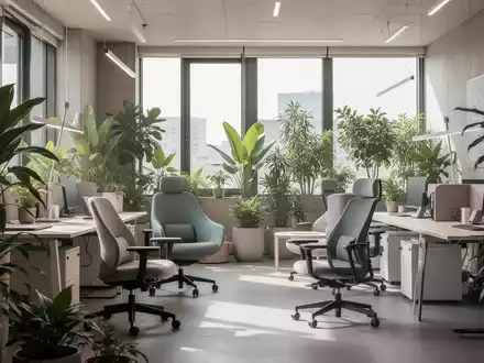Ein modernes, minimalistisches Büro mit vielen grünen Pflanzen, natürlichem Licht und ergonomischen Möbeln, das eine stressfreie Atmosphäre schafft. - Foto: über boerse-global.de