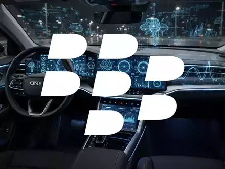 Ein modernes Auto-Interieur mit einem digitalen Armaturenbrett, das futuristische KI-Schnittstellen und Datenvisualisierungen anzeigt, als Symbol für QNX. - Foto: über boerse-global.de
