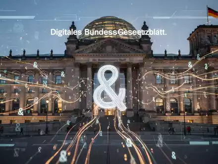Ein digitaler Bildschirm zeigt das Bundesgesetzblatt mit leuchtenden Daten und Paragraphenzeichen vor einer stilisierten Regierungsarchitektur. - Foto: über boerse-global.de