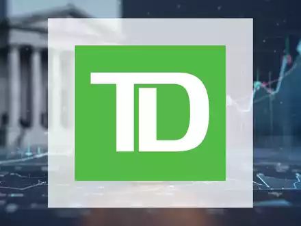 Eine Nahaufnahme einer kanadischen Dollarmünze, umgeben von abstrakten Finanzdaten, die die Berichterstattung der Toronto-Dominion Bank widerspiegeln. - Foto: über boerse-global.de